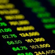 A close up shot of numbers indicating changes in stock value